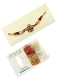 Designer mart rakhi set : 1 Ganesh ji Rakhi + 1 Tilak - Designer mart